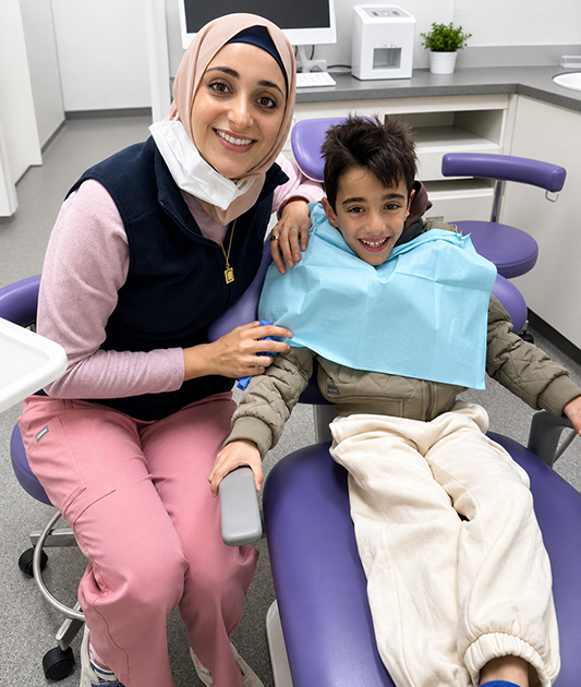 Staff and young patient at Lakemba Dental